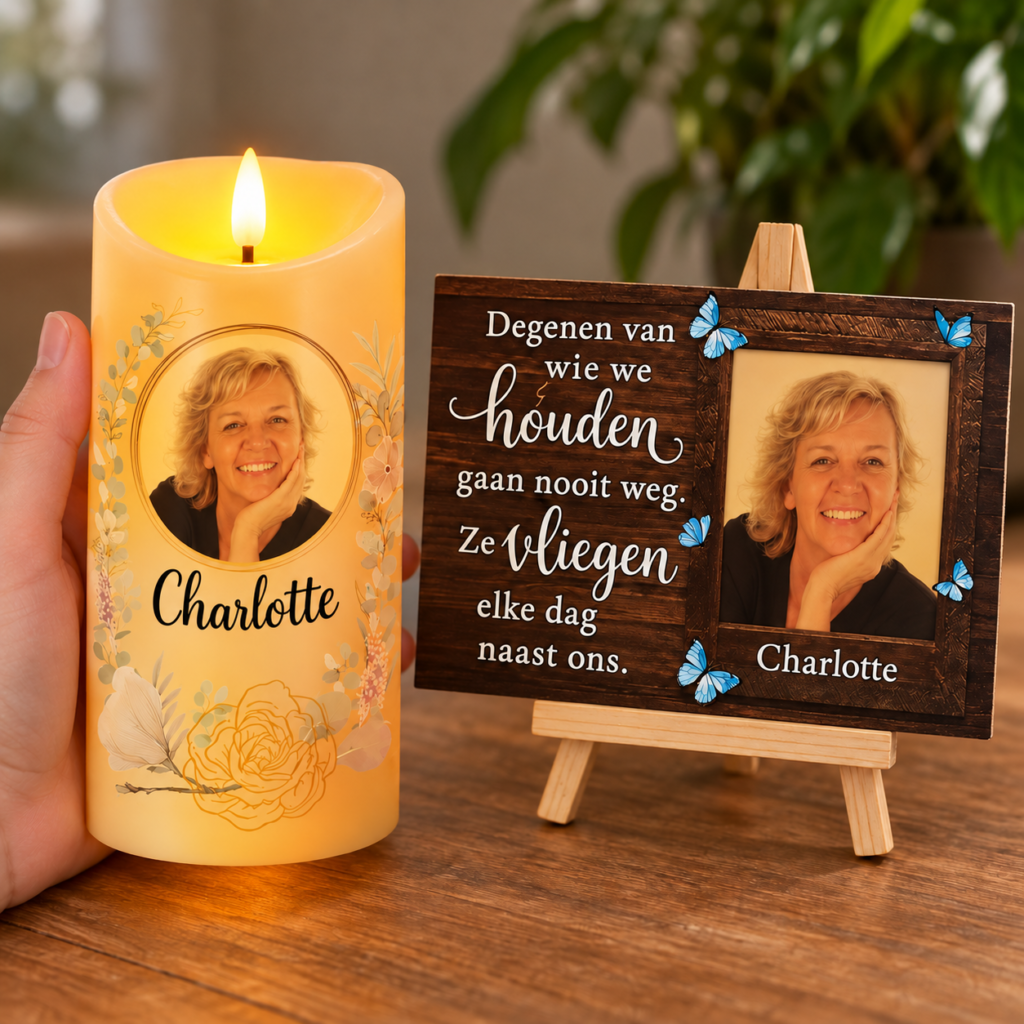 LED-kaars in de hand en acryl fotoplaatje op houten standaard